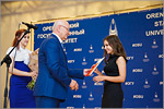 Awarding of the diploma with honors to Maria Popello, 150.000th OSU graduate.     [117 Kb]