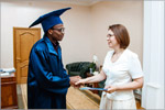 Zhanna Ermakova, OSU Rector presented two graduation diplomas to the student from Equatorial Guinea.     [136 Kb]
